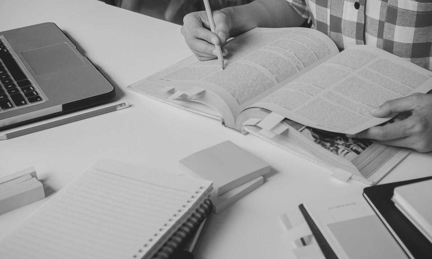 Strategic financial planning session with documentation and analysis tools